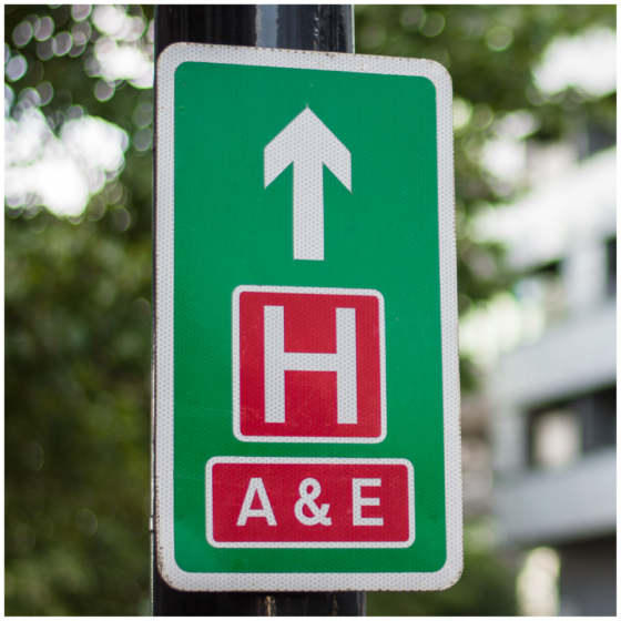 Sign directing towards a hospital