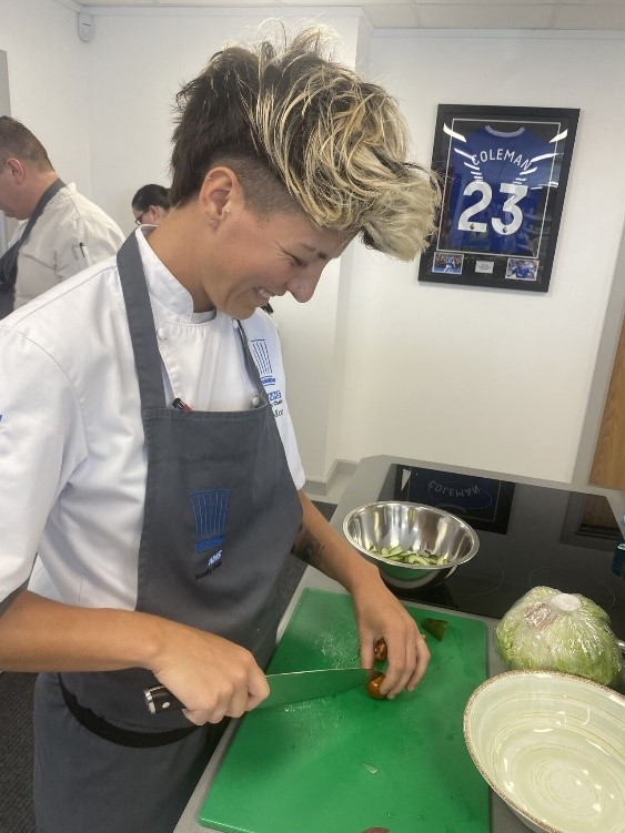 Cher preparing a salad Cher preparing a salad