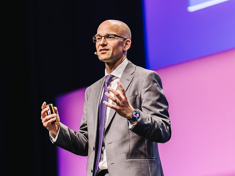 Andrew New at a Conference