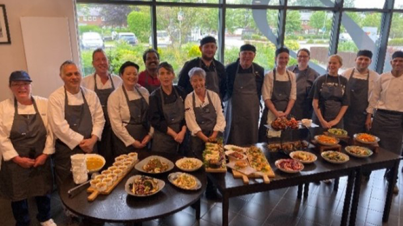 Image of Chef's Academy Attendees with their Food