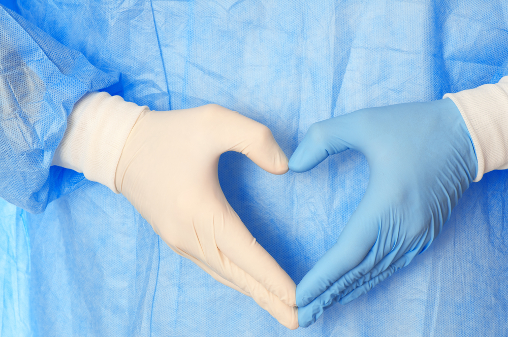 Doctors gloves in shape of a heart