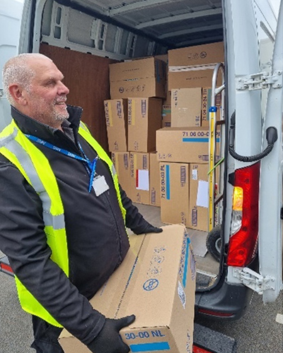 Home Delivery Service Driver Unloading Truck