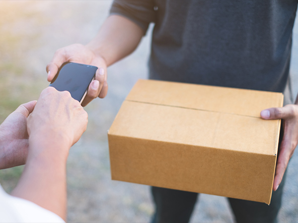 Home Delivery Service Being Signed For