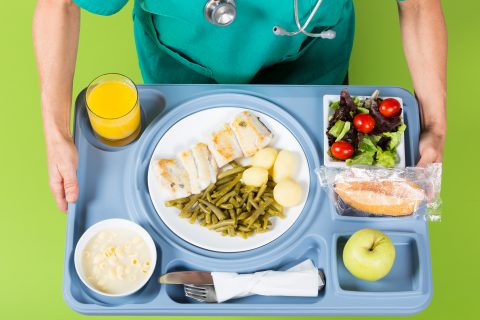 Hospital tray containing food.