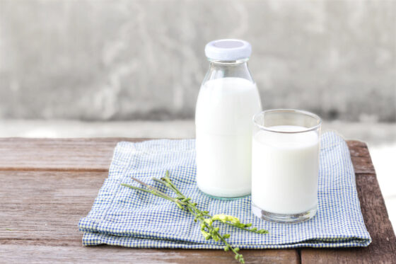 Illustrative Picture of milk bottle and glass
