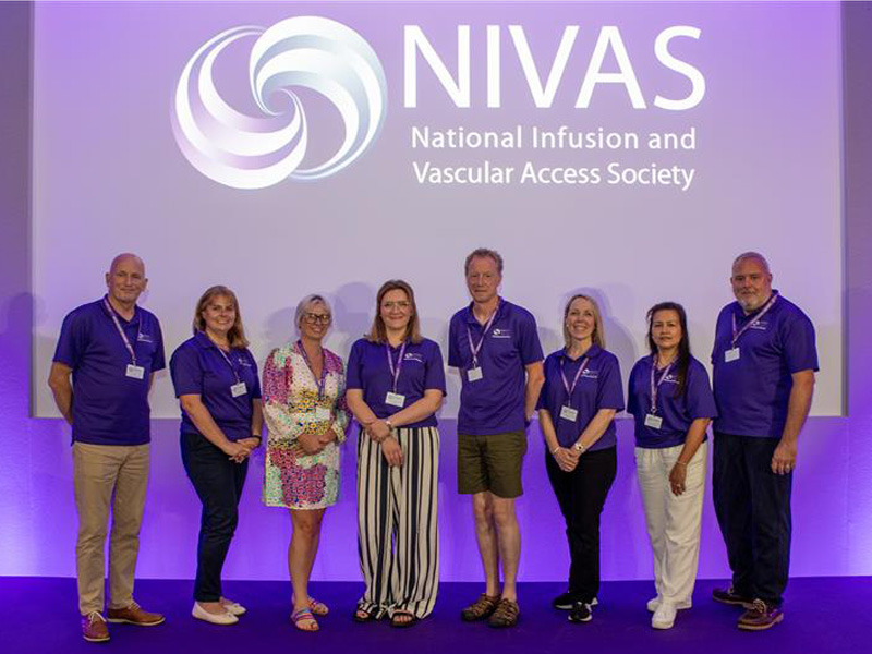 Maya Guerrero at the 13th NIVAS Conference 2025 with seven other participants 
