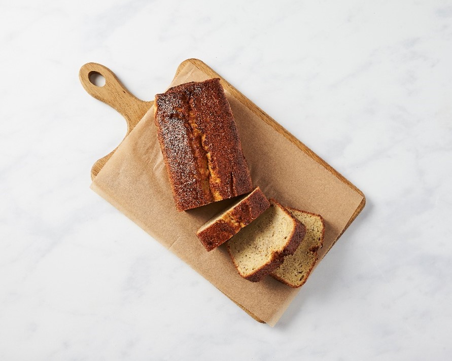 Apple and ginger cake on a wooden board