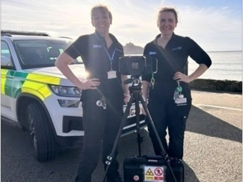Ambulance staff with ultra‑portable X‑ray equipment