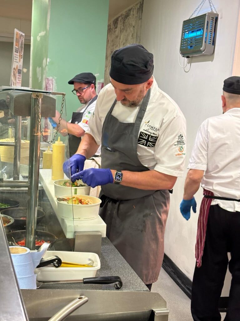 Chefs serving food in Royal Free Hospital’s kitchen Chefs serving food in Royal Free Hospital’s kitchen