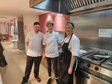 Three chefs in the hospital kitchen Three chefs in the hospital kitchen