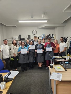 Sheffield Children’s Hospital’s staff holding their culinary certificates Sheffield Children’s Hospital’s staff holding their culinary certificates