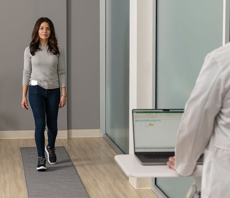 Patient being assessed while wearing Apos® medical device.