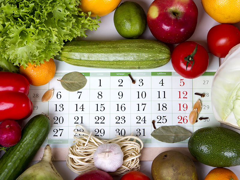 Calendar with fresh fruit and vegetables 