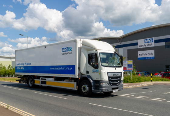 NHS 75th Birthday Truck Driving Past Suffolk Park Warehouse, Bury St Edmunds