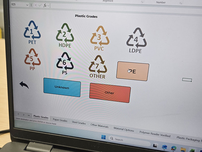 Plastic grade symbols on a laptop screen